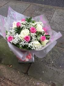 Pink and white rose hand tied